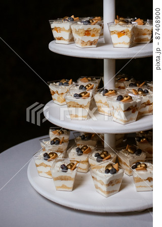 wedding cake at the wedding of the newlyweds wedding cake at the wedding of the newlyweds 87408900
