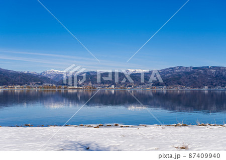 雪が残る諏訪湖畔 岡谷下諏訪方面 雪が残る諏訪湖畔 岡谷下諏訪方面 87409940