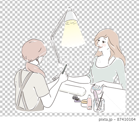 ネイルサロンで施術を受けるかわいい女性 甘皮処理 ネイルサロンで施術を受けるかわいい女性 甘皮処理 87410104