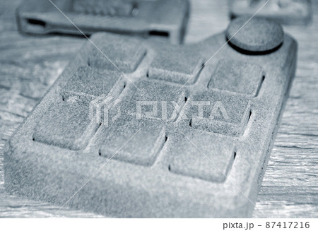 Different objects printed on industrial powder 3D printer. Multi Jet Fusion MJF 87417216