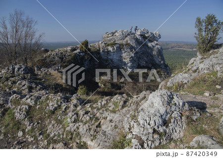 Limestone rocks in Podlesice, Silesian Voivodeship, Poland. Upland Krakow-Czestochowa. Limestone rocks in Podlesice, Silesian Voivodeship, Poland. Upland Krakow-Czestochowa. 87420349