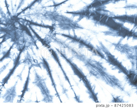 Tie dye shibori pattern. Abstract tie-dye technique hand dyed fabric. 87425083