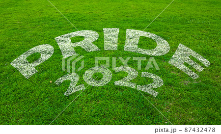 Green field with white text Pride 2022 87432478