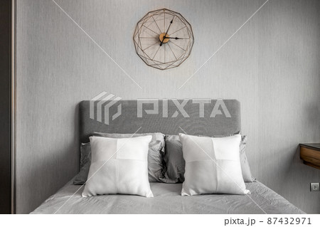 Many soft pillows on comfortable bed indoors Many soft pillows on comfortable bed indoors 87432971