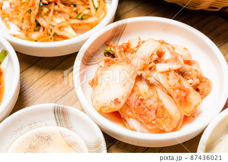 Korean pickle or Pickled radish vegetables and seasoning on bowl Korean pickle or Pickled radish vegetables and seasoning on bowl 87436021