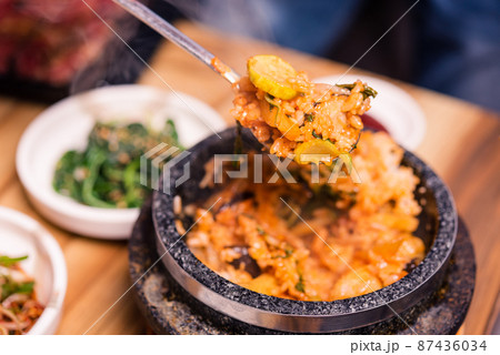 Korean traditional dish- bibimbap mixed rice with vegetables Include beef and fried egg Korean traditional dish- bibimbap mixed rice with vegetables Include beef and fried egg 87436034