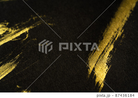 黒と金の背景テクスチャ 87436184