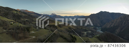 Awesome landscape photo of the Seriana valley and its mountains at sunrise Awesome landscape photo of the Seriana valley and its mountains at sunrise 87436306