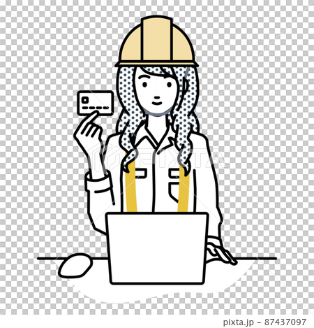 A woman at a construction site sitting at a desk and using a PC while holding a credit card A woman at a construction site sitting at a desk and using a PC while holding a credit card 87437097
