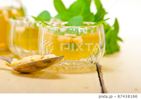 Arab traditional mint and pine nuts tea Arab traditional mint and pine nuts tea 87438166