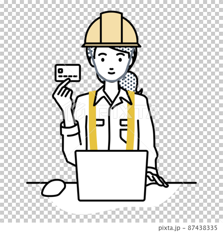 デスクで座ってPCを使いながらクレジットカードを手に持っている工事現場の女性 87438335