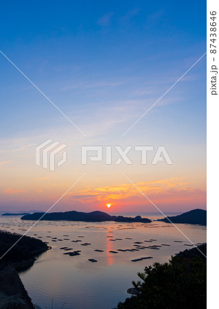 虫明湾の日の出 87438646