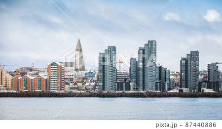 Reykjavik with modern houses and Hallgrimskirkja cathedral 87440886