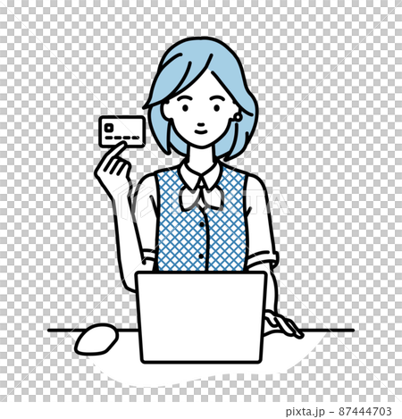 A woman in a clerk uniform sitting at a desk and using a PC while holding a credit card 87444703
