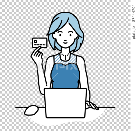 デスクで座ってPCを使いながらクレジットカードを手に持っているドレスの女性 デスクで座ってPCを使いながらクレジットカードを手に持っているドレスの女性 87444704
