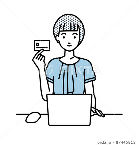 デスクで座ってPCを使いながらクレジットカードを手に持っているオフィスカジュアルの女性 デスクで座ってPCを使いながらクレジットカードを手に持っているオフィスカジュアルの女性 87445915