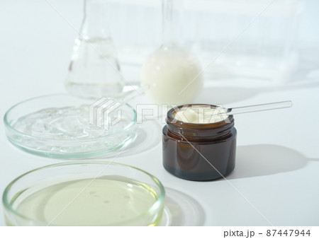 laboratory dishes and glassware on a lab table. fermentation, fermented beauty skin care. enzyme serum for anti age treatment. laboratory dishes and glassware on a lab table. fermentation, fermented beauty skin care. enzyme serum for anti age treatment. 87447944