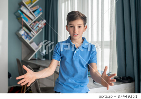 Boy showing his determination and confidence during the communication 87449351