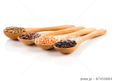 lentils in spoon isolated 87450664