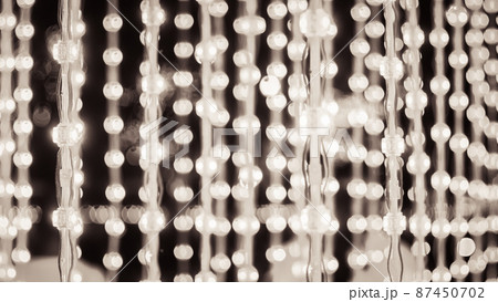 String lights, wood background lightbulbs bokeh merry Christmas street lighting in street party in town garden evening people happy night street bokeh festival on streetlight vibrant bulb party lights 87450702