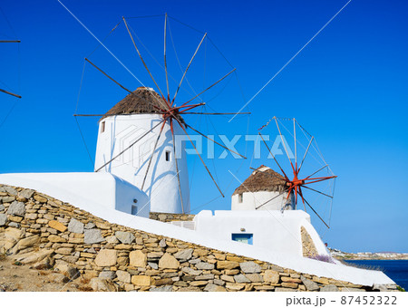Mykonos, Greece. Traditional windmills. The symbol of Mykonos at the day time.  87452322