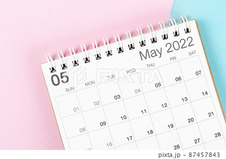 May 2022 desk calendar on beautiful background. 87457843