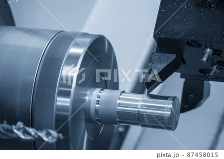 The CNC lathe machine forming cutting the metal shaft parts. The CNC lathe machine forming cutting the metal shaft parts. 87458015
