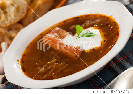 Shchi with pork in mushroom broth with sour cream Shchi with pork in mushroom broth with sour cream 87458777