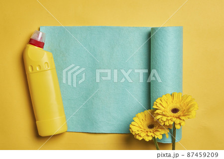 Cleaning service concept. Spring cleaning. Cleaning chemical bottles and supplies. House cleaning concept on colored background 87459209