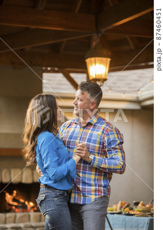 Mature couple dancing at home 87460451