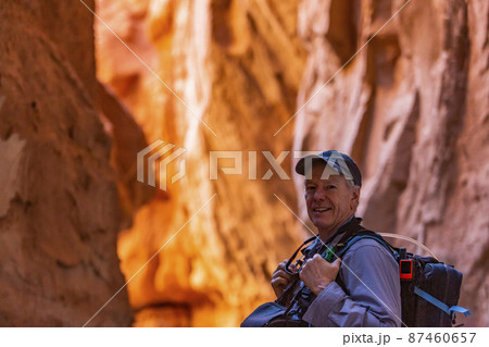 United States, Utah, Escalante, Senior hiker exploring rock formations in Kodachrome Basin State Park near Escalante Grand Staircase National Monument United States, Utah, Escalante, Senior hiker exploring rock formations in Kodachrome Basin State Park near Escalante Grand Staircase National Monument 87460657