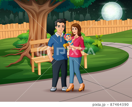 Happy family walks in park at night 87464390