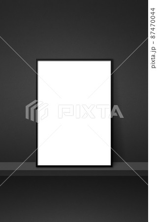 Picture frame leaning on a black shelf. 3d illustration. Vertical background Picture frame leaning on a black shelf. 3d illustration. Vertical background 87470044