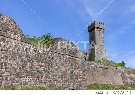 Close view to the brick walls of Radicofani construction and Tower Close view to the brick walls of Radicofani construction and Tower 87472514