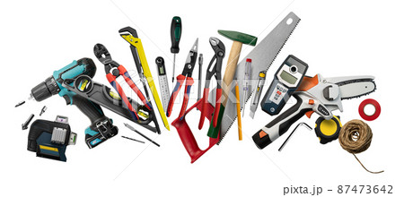 Construction tools levitate on a white background Construction tools levitate on a white background 87473642