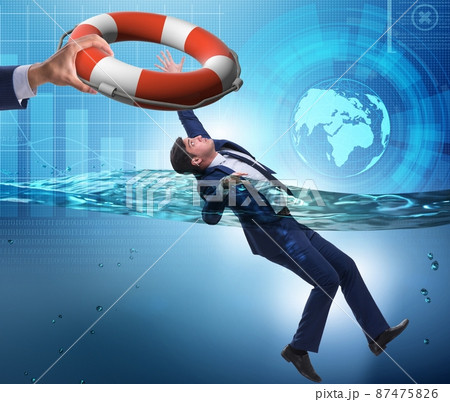 Businessman being saved from drowning 87475826