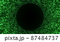 A green illustration of countless glowing dust particles forming a round frame. 87484737