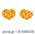 Whole and bitten chocolate cookies heart form 87486038