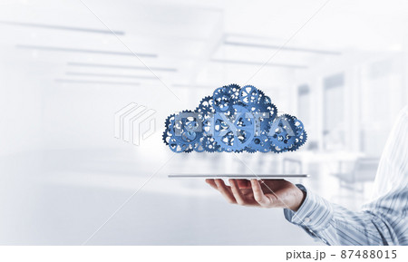 Mechanisms as symbol of wireless connection and interaction presented on white office background 87488015