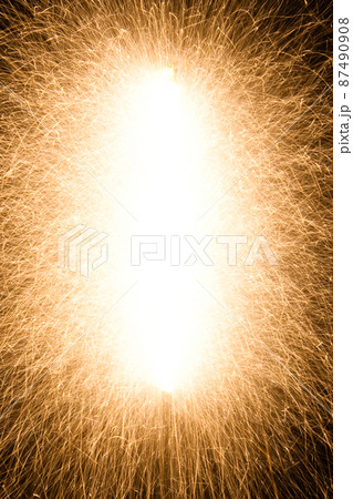 fire sparks particles on black background for overlay design, shot taken with slow shutter, long traces, large sheaf of sparks, emission source on the top left corner fire sparks particles on black background for overlay design, shot taken with slow shutter, long traces, large sheaf of sparks, emission source on the top left corner 87490908