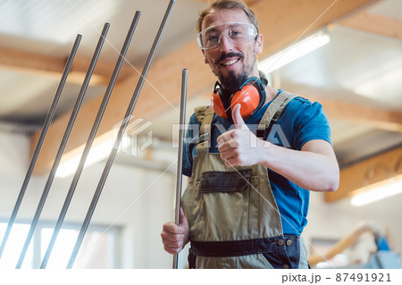 Stairway maker in his workshop 87491921