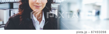 Call center or customer support agent in broaden view panoramic banner 87493098