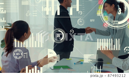Business people in corporate staff meeting with envisional graphic 87493212