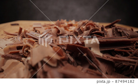 Macro shot of chocolate flakes Macro shot of chocolate flakes 87494182