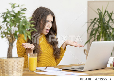 Female angering and annoying, surprised broken Internet line. Young woman student 87495513