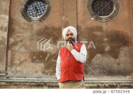 Portrait of Indian sikh man in turban with bushy beard Portrait of Indian sikh man in turban with bushy beard 87502349