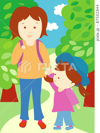 天気の良い日に緑の多い公園を親子でお出かけ(ピクニック) 87502844