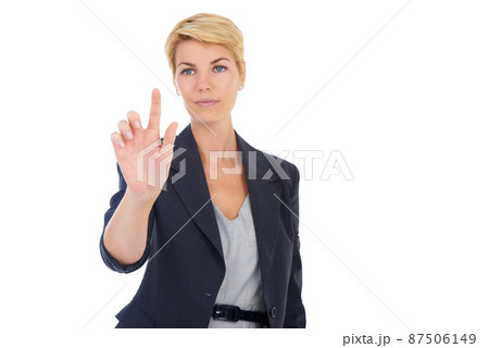 Touchscreen technology. A young businesswoman using a digital interface. 87506149