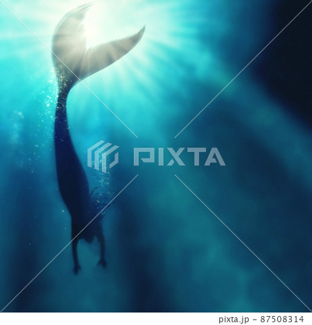 A silhouette shot of a mermaid swimming in solitude in the deep blue sea - ALL design on this image is created from scratch by Yuri Arcurs team of professionals for this particular photo shoot 87508314