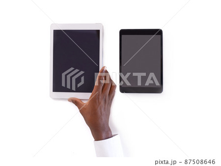 Tools of the trade. Cropped shot of a hand holding a digital tablet. 87508646